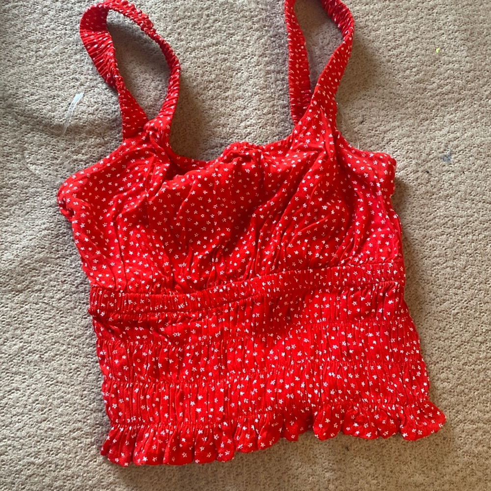 A cute flowered tank. Good stitching. Size XS.